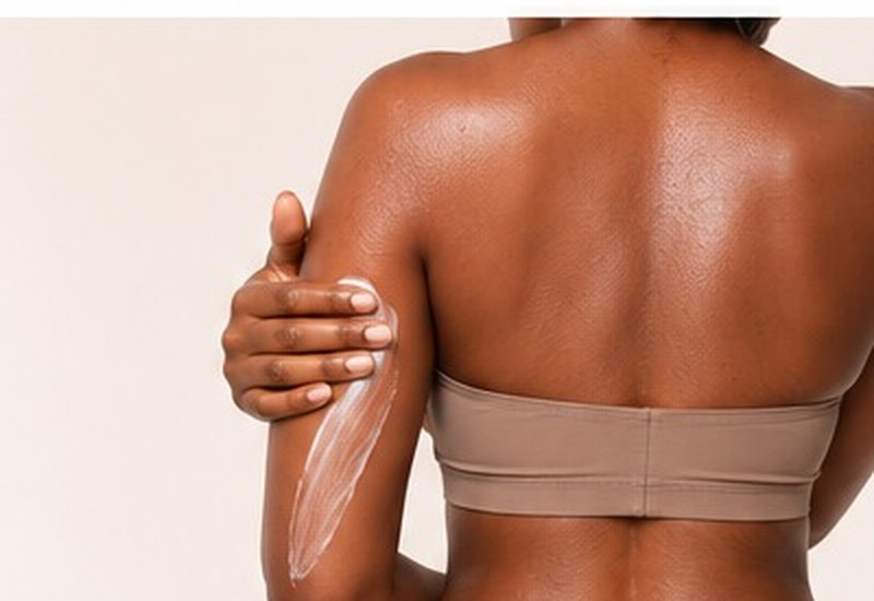 Applying brightening body lotion