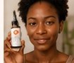 Customer holding Skin Glow Up product