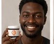 Customer holding Skin Glow Up product