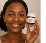 Customer holding Skin Glow Up product